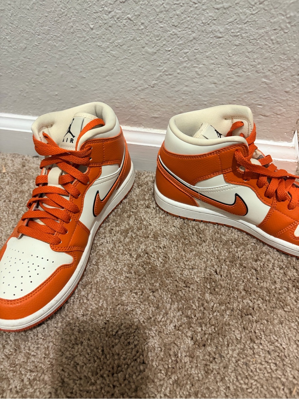 Jordan 1 Mids, Size 7 Women’s Sneakers in Orange/White
